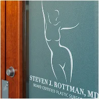 Steven L. Hottman MD Board Certified Plastic Surgeon office door sign with female figure outline