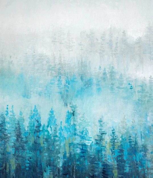 Misty forest landscape with blue and white tones creating an abstract ethereal atmosphere